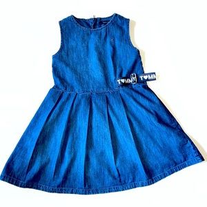 Tommy Hilfiger denim pleated dress lightly used Size 8 (guitar not included).
